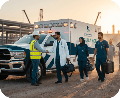 Medical team beside an ambulance on an industrial site